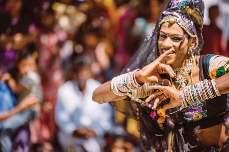 A photo shows an Indian Hijra during a dance performance.